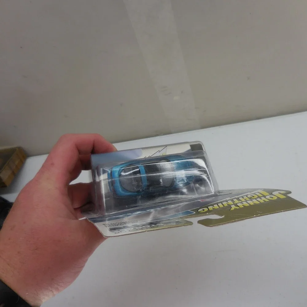 Johnny Lightning 1994 Pontiac Firebird T/A Blue Die-Cast 1:64‎ with Storage Tin